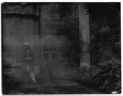 This is a collodion wet plate image of Katie at Lacock.